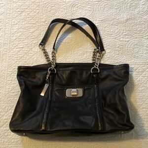 DKNY black leather turn lock purse satchel.